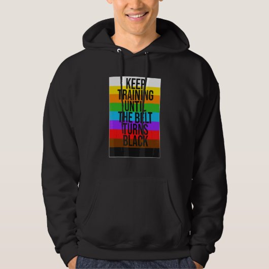 Trainiere weiter, bis der Gürtel schwarz wird Kara Hoodie (Vorderseite)