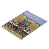 Traktor, der einen Maissaatgutpflanzer zieht Notizblock (Linke Seite)