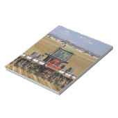 Traktor, der einen Samenkornpflanzer zieht. Notizblock (Rotiert)