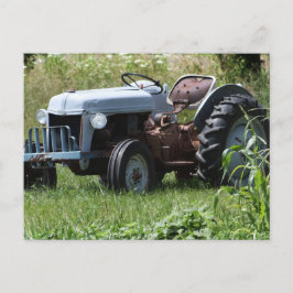 Traktor in einem Feld Postkarte