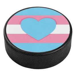 trans flag and heart hockey puck