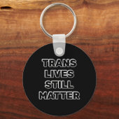 Trans lebt noch - Trans Rights Schlüsselanhänger (Vorderseite)