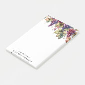 Trauben auf dem Wein vom Schreibtisch der Post-it Klebezettel (angewinkelt)