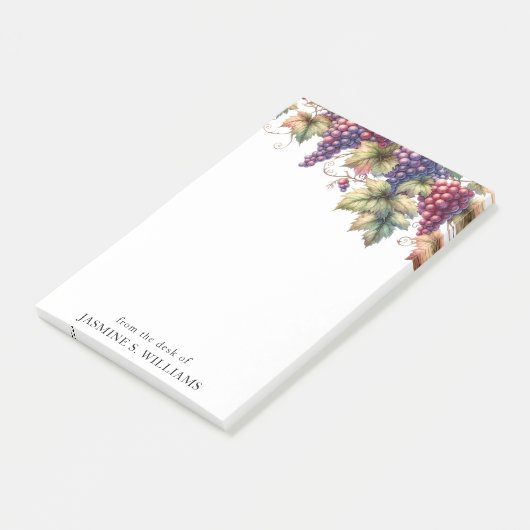 Trauben auf dem Wein vom Schreibtisch der Post-it Klebezettel (angewinkelt)