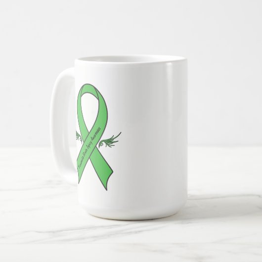 Traumatisches Hirnverletzung-Band mit Flügeln Kaffeetasse (Vorderseite Links)