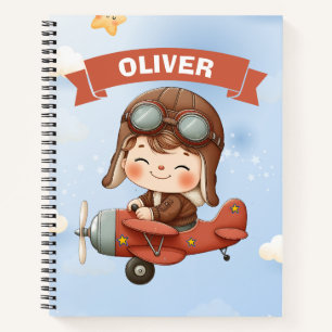Träumendes Baby Aviator in rotem Flugzeug Notizblock