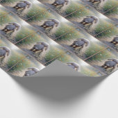 Trauriges Hasen mit Floppy-Ohr mit einem Knöchel Geschenkpapier (Ecke)