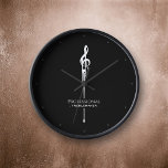 Treblemaker Funny Music Pun Classy Black G-Clef Uhr<br><div class="desc">Die in schwarz-weiß gehaltene Uhr ist sonnig und sonnig, stilvoll und witzig mit ihrem Musikpun und den passenden Optionen. Spaß für die beruflichen Trekkingmacher / Troublemakers in Ihrem Leben - aka: Musiker, Musiklehrer, Chordirektoren, Bandleader und andere musikalische Unheil. Der tropfende G-clef ist ein einzigartiger Einstieg in den klassischen Treble-Klettmusik, der...</div>