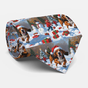 Treeing Walker Coonhound Schnee mit Weihnachtsmütz Krawatte