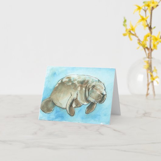 "Treibendes Manatis", eine Manatisgrußkarte Karte (Gelbe Blume)