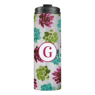 Trendfarbene Sukkulturen und rustikale Holzplanks Thermosbecher