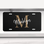 Trendy Black Gold Monogram Girly Feminine Script US Nummernschild<br><div class="desc">Trendy Black Gold Monogram Girly Feminine Script License Plate. Dieses moderne,  elegante Nummernschild personalisieren Sie einfach mit Ihrem individuellen Monogramm und Namen.</div>