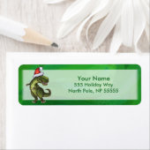 TRex in Weihnachtsmannmütze auf Grün (Insitu)