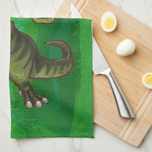 TRex in Weihnachtsmannmütze auf Grün Handtuch (Viertel Falte)