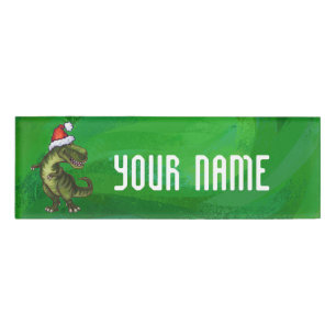 TRex in Weihnachtsmannmütze auf Grün Namenschild