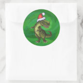 TRex in Weihnachtsmannmütze auf Grün Runder Aufkleber (Tasche)
