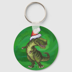 TRex in Weihnachtsmannmütze auf Grün Schlüsselanhänger