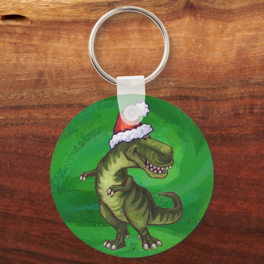 TRex in Weihnachtsmannmütze auf Grün Schlüsselanhänger (Vorderseite)