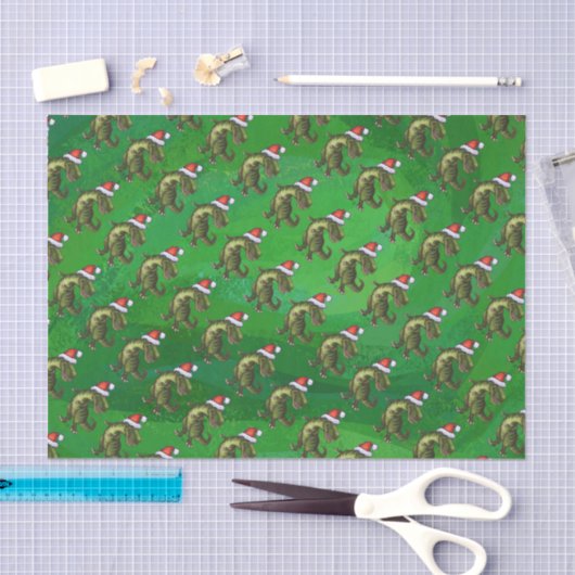 TRex in Weihnachtsmannmütze auf Grün Seidenpapier (Handwerk)