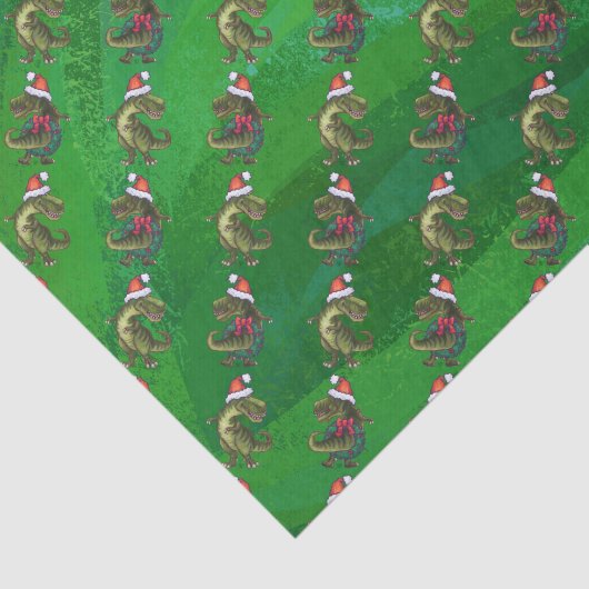 TRex in Weihnachtsmannmütze auf Grün Seidenpapier (Ausschnitt)