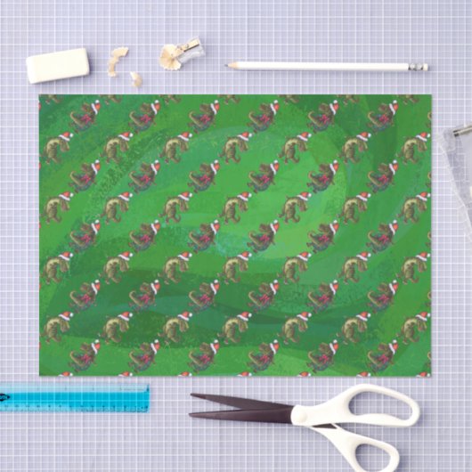 TRex in Weihnachtsmannmütze auf Grün Seidenpapier (Handwerk)