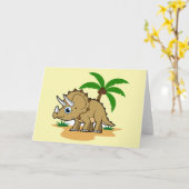 Triceratops in einem tropischen Klima. Karte (Gelbe Blume)