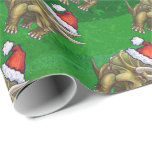 Tricerops Christmas Green Geschenkpapier<br><div class="desc">Animal Parade Festive Triceratops Weihnachtsdesign zeigt unsere lustige Illustration eines Triceratops mit einer Feiertagsroten Weihnachtsmannmütze und stehend in einer schneebedeckten Landschaft gegen eine blaue Sternennacht. Unsere ursprüngliche Dinosaurierkunst wurde von unserem talentierten Kinderillustrator Traci Van Wagoner gemalt. Auf vielen unserer lustigen Urlaubsgeschenke und Accessoires finden Sie unseren niedlichen Triceratops Dinosaurier von...</div>