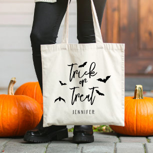 Trick oder behandeln moderne Typografie und Fleder Tragetasche