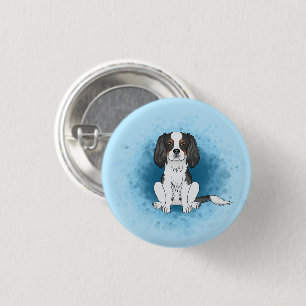 Tricolor Cavalier King Charles Spaniel Dog On Blue Button