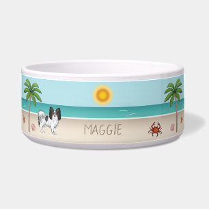 Tricolor Papillon Dog an einem tropischen Sommerst Napf