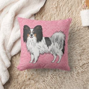 Tricolor Papillon Spielzeug Rasse Hund auf rosa He Kissen