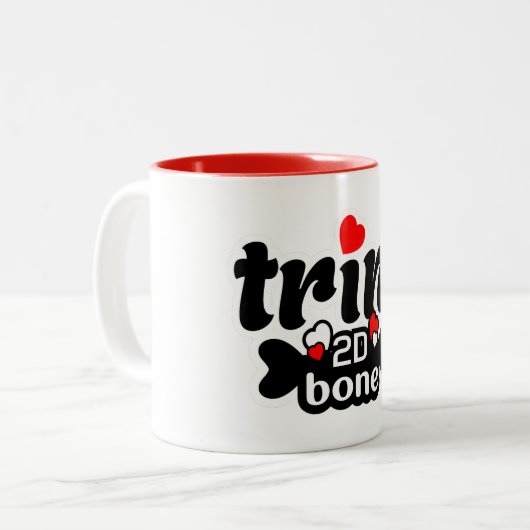 Trini 2D Bone Zweifarbige Tasse (Vorderseite Links)
