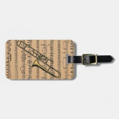 Trombone mit Notenen-Hintergrund Gepäckanhänger (Vorderseite horizontal)