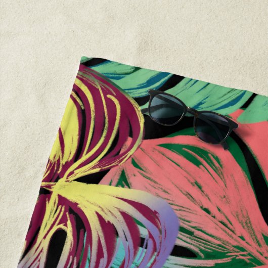 Tropenfarbenes Monsterblatt auf schwarz Strandtuch (Beispiel)