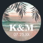 Tropical Beach Wedding | String of Lights Monogram Runder Aufkleber<br><div class="desc">Beach destination monogram stickers featuring a tropical palm beach setting, string twinkle lights, and a modern text template. Click on the “Customize it” button for further personalization of this template. You will be able to modify all text, including the style, colors, and sizes. You will find matching items further down...</div>