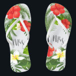 Tropical Floral Mrs. Bride ID475 Badesandalen<br><div class="desc">Erschaffen Sie besondere Flipflops für die Braut mit diesem schönen Design mit üppigem tropischem Blattwerk und farbenfrohen Blumenakzenten. Das auffällige 'mrs' Skript ist optional und kann gelöscht werden, um die Vorlage für andere Anlässe zu verwenden. Suchen Sie nach ID475, um weitere Produkte mit diesem Design zu sehen, inklusive der passenden...</div>