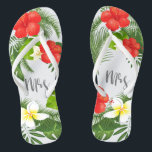 Tropical Floral Mrs. Bride ID475 Badesandalen<br><div class="desc">Erschaffen Sie besondere Flipflops für die Braut mit diesem schönen Design mit üppigem tropischem Blattwerk und farbenfrohen Blumenakzenten. Das auffällige 'mrs' Skript ist optional und kann gelöscht werden, um die Vorlage für andere Anlässe zu verwenden. Suchen Sie nach ID475, um weitere Produkte mit diesem Design zu sehen, inklusive der passenden...</div>