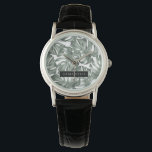 Tropical Watercolor Modern Oasis Leaves Armbanduhr<br><div class="desc">Die neue Kollektion Tropical Watercolor Moderne Oasis Blätter Muster ist ab sofort auf Zazzle erhältlich! Tauchen Sie ein in die lebendige Schönheit der Natur mit diesen atemberaubenden Produkten, die eine zeitgenössische Drehung auf tropischem Laub bieten.Wählen Sie aus einer großen Auswahl an Produkten, um Ihre Bedürfnisse und Ihren persönlichen Stil zu...</div>
