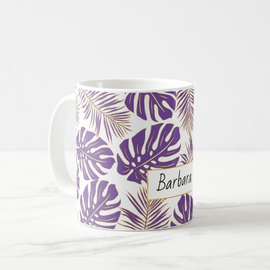 tropische Blätter mit lila und goldfarbenem Hinter Kaffeetasse (Vorderseite Links)