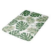 Tropische Blätter und Monogramm, grün und gold Badematte (Schrägansicht)