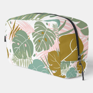 Tropische Folien - Muster aus Monstera und Palmblä Waschbeutel