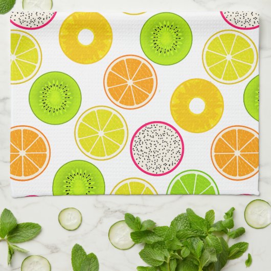 Tropische Fruchtscheiben, Zitrusfrüchte, Kiwi und  Geschirrtuch (Gefaltet)