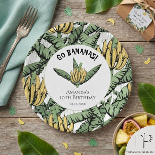 Tropische gelbe Bananenblätter Weiße Papierplatten Pappteller