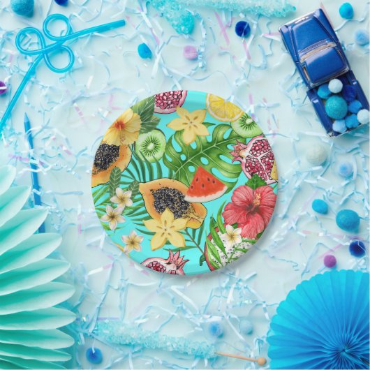Tropische Mischfrüchte, Blume und Blätter auf blau Pappteller (Party)