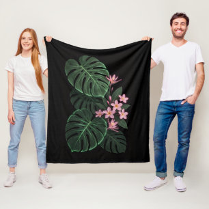 Tropische Monstera-Blätter und rosa Hibiskus-Flane Fleecedecke