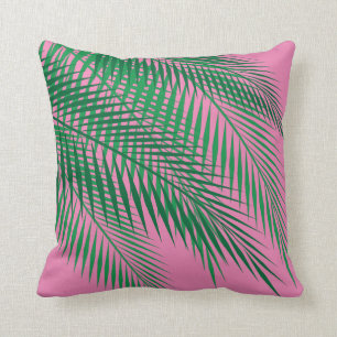 Tropische Palmblätter auf rosa Himmel Kissen