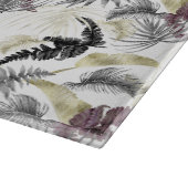 Tropische Palmen, frisch im Wein und schwarz Schneidebrett (Ecke)