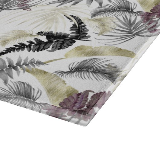 Tropische Palmen, frisch im Wein und schwarz Schneidebrett (Ecke)