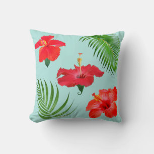 Tropische rote Hibiskusblüten und Palmwedel Wurf Kissen
