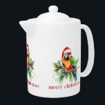 Tropischer Weihnachtsbird Retro Frohe Weihnachten<br><div class="desc">Dieses tropische Thema Weihnachts-Papier Tasse Design zeigt einen tropischen Vogel mit einer Weihnachtsmannmütze Urlaub Grün und rot Retro Frohe Weihnachtstypografie. Lassen Sie sich in dieser Urlaubssaison mit dieser Tasse voll von Ihrem Lieblingsgetränk verwöhnen.</div>